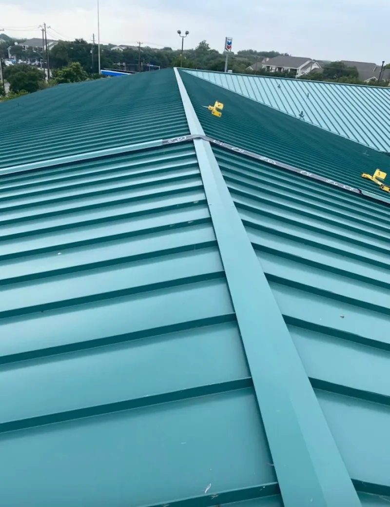 Green commercial metal roof ridge and valley for Metal Roof Repair in Lewistown